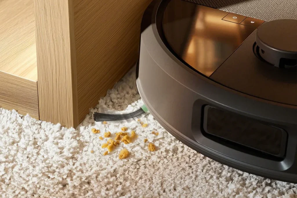 Roomba Max 705 robotstøvsuger renser gulvtæppe med AutoEmpty dock